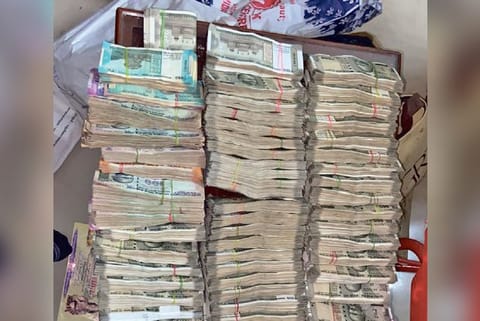 The unaccounted cash found in the house of TNPCB engineer Dhanaraj at Urappakkam near Chennai