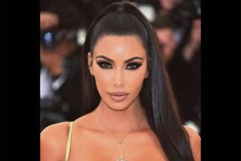 Kim Kardashian caught kissing hubby Kanye in public