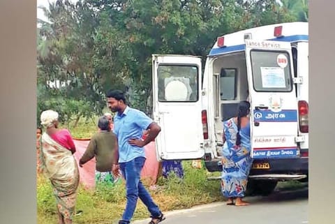 Women assist Sonia during the delivery at Raghunathapuram