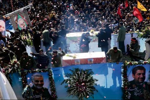 Iranian commander's body in hometown, U.S. denies quitting Iraq