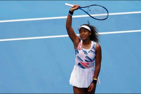 Japan's Naomi Osaka celebrates winning the match against Czech Republic's Marie Bouzkova