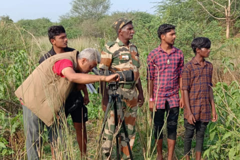 Foresters and bird watchers identify nests during bird census at Udayamarthandapuram bird sanctuary