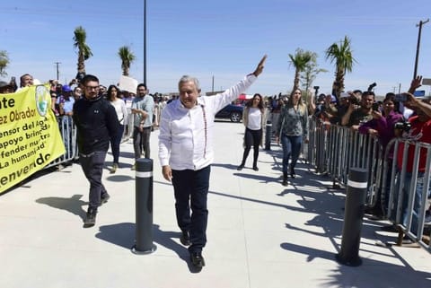 Mexico president visits 'El Chapo's' home turf, shakes hands with his mother