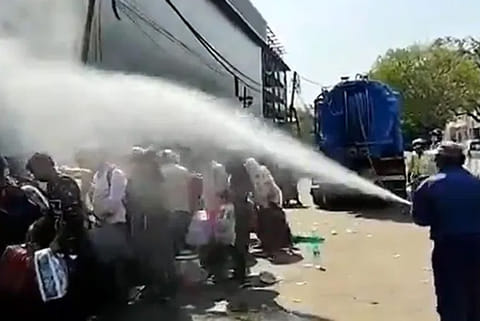 Spraying disinfectant on migrants a criminal act: AAP