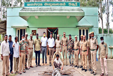 The arrested farmer with the fencing material and two tusks at the Forest Department in Krishnagiri