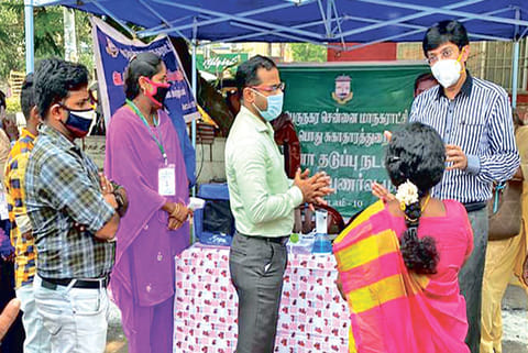 Health Secretary inspected a COVID awareness camp organised by the Corporation at Vadapalani bus dep