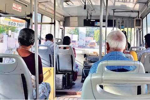 Passengers seen sitting close to each other flouting social distancing norms on a government bus