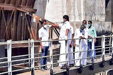 Kalasapakkam MLA V Paneeerselvam checking repair work at Shenbagathoppu dam in Tiruvannamalai dist