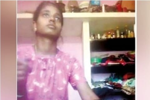 Screengrab of Thulasi beating her son