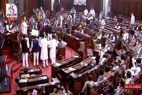 Opposition party members shouting slogans in Rajya Sabha