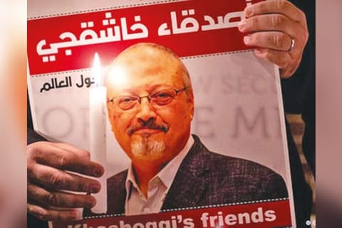 A person holding a picture of Saudi dissident journalist Jamal Khashoggi  (File Photo)