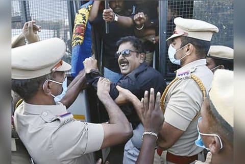 Police arrests the protest TPDK members.