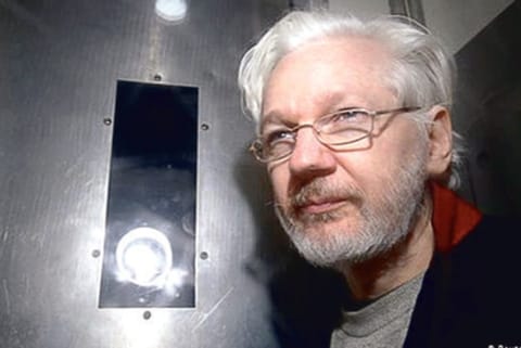 Understanding dual identities of Assange