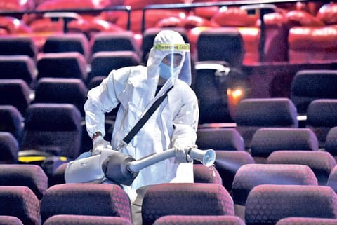 A cinema hall being sanitised