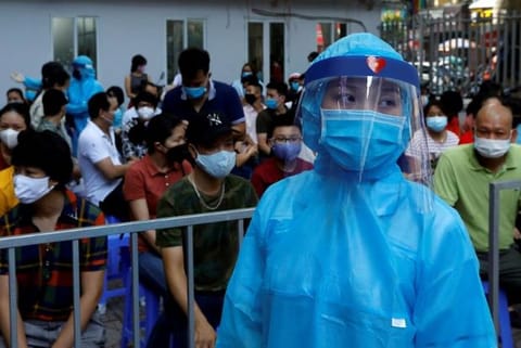 Hanoi tightens restrictions as COVID clusters spread in Vietnam