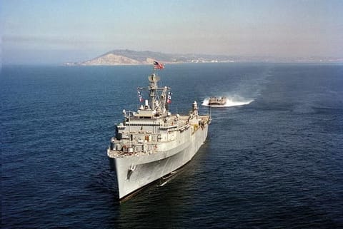 Russia summons UK envoy over warship intrusion