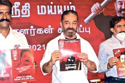 MNM chief Kamal Haasan releasing the manifesto in Coimbatore