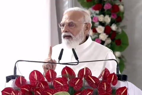 Modi addressing the Kushinagar rally. Image Courtesy: Twitter screengrab - @narendramodi