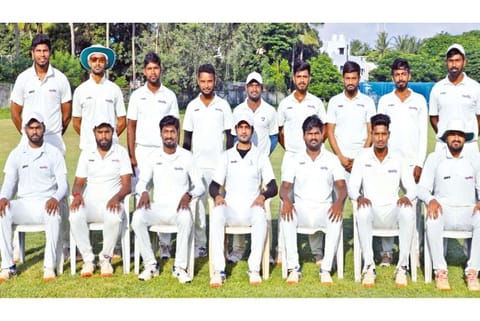 Apollo Tyres squad members pose for the winner?s photograph. The team won the final by 3 runs