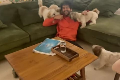Kartik Aaryan with puppies (Image source: IANS)