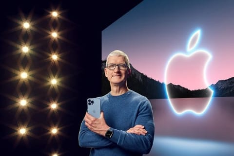 Apple CEO Tim Cook holds the iPhone 13 Pro Max during a special event at Apple Park in Cupertino, California