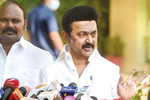 Stalin addresses media outside a polling booth, on Saturday