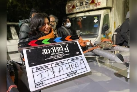 The clapboard of the film with the words "It's a wrap"