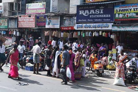 Hawkers encroach a pavement in Braodway