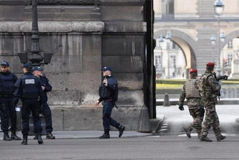 French soldier shoots, wounds machete-wielding attacker at Paris Louvre