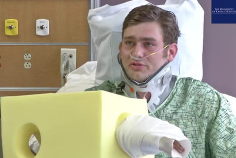 Ian Grillot was shot through the arm and chest