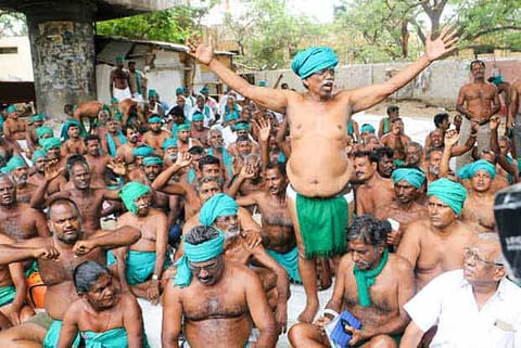 P Ayyakannu, staging an indefinite protest, along with a group of farmers in Chennai on Friday