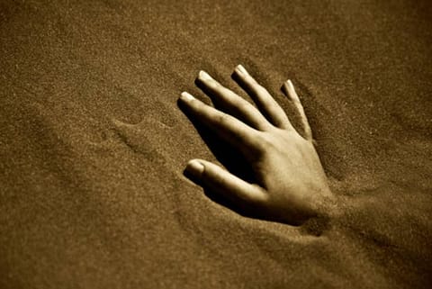 Representative Image of a person buried alive