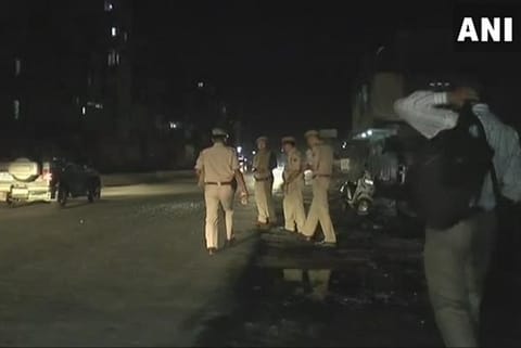ANI image grab of police troops near Nagamapal Road, Imphal where a low intensity IED bomb exploded