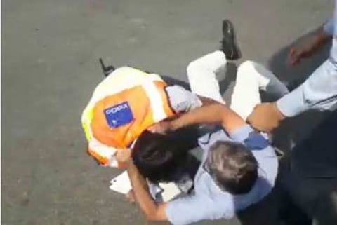 Screengrab of the scuffle.(Twitter | ANI)