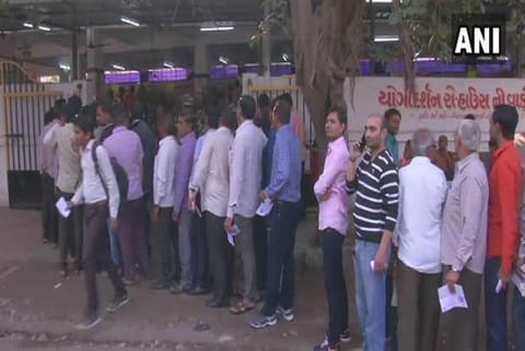 Visuals of locals waiting to cast their vote