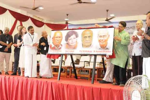 Portraits of civil society leaders being unveiled at the World Atheist Conference in Tiruchy on Frid