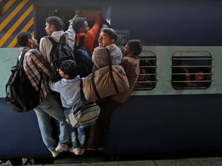 Five feared dead after commuters fall from overcrowded Mumbai local train