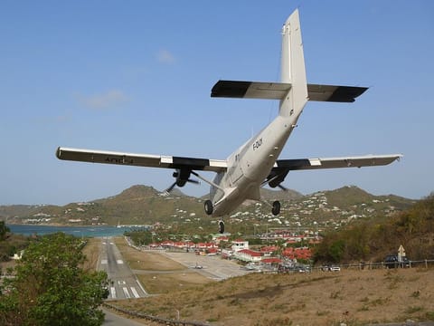 Saint Barthelemy Airport, also known as Gustaf III Airport, is a public-use airport located in the village of St. Jean on the Caribbean island of St. Barths. It is considered one of the most dangerous airports in the world because pilots have to descend steeply down over a hilltop on to an extremely short runway that ends on the beach.