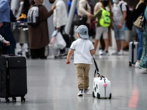 The boy reportedly told police that his parents had already boarded the plane and were on their way home.