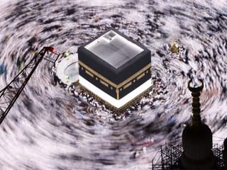 Pilgrims perform the Umrah at the Holy Kaaba, as they start arriving to perform the annual Hajj at the Grand Mosque, in the holy city of Mecca, Saudi Arabia.