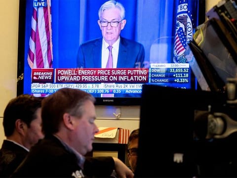 US Federal Reserve Chairman Jerome Powell on screen
