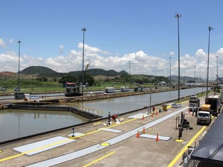 The Panama Canal is an artificial 82km waterway in Panama that connects the Atlantic Ocean with the Pacific Ocean and divides North and South America. The canal that cuts across the Isthmus of Panama facilitates maritime trade as it greatly reduces the time for ships to travel between the Atlantic and Pacific oceans.