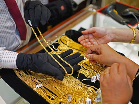 Wednesday's surge follows months of fluctuating gold prices as markets navigate global economic challenges. 
