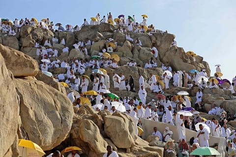 After sunset prayers, pilgrims make their way down Mount Arafat to Muzdalifah, another holy site where they will sleep under the stars to prepare for the final stage of Hajj, the symbolic "stoning of the devil".