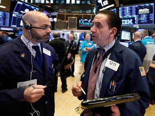 Traders at the New York Stock Exchange on Wall Street.