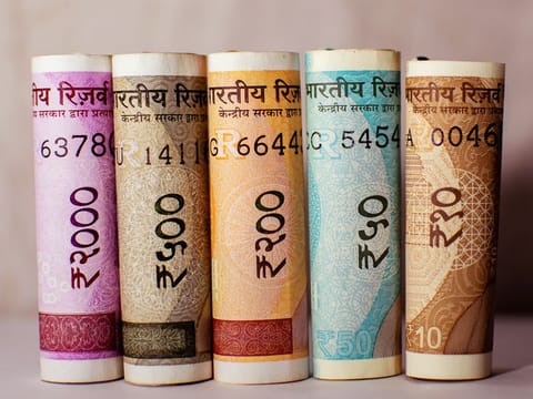 The rupee's has shed value against the dirham/dollar - should UAE Indian expats wait for it to fall to 23.5?