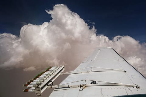 Hygroscopic flares are attached to an aircraft during a cloud seeding flight operated by the National Centre of Meteorology. Recent downpours across Al Ain, Ras Al Khaimah, and other eastern regions of the UAE are not just a stroke of luck; they are the result of a sophisticated weather modification technique known as cloud seeding.