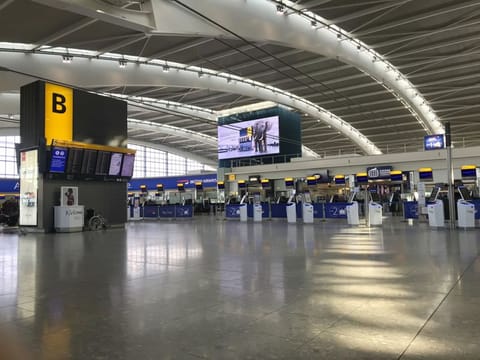 A view of the near empty departure area at London's Heathrow Airport's Terminal 5 departure