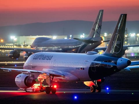 Lufthansa aircrafts are parked at the airport in Frankfurt. 