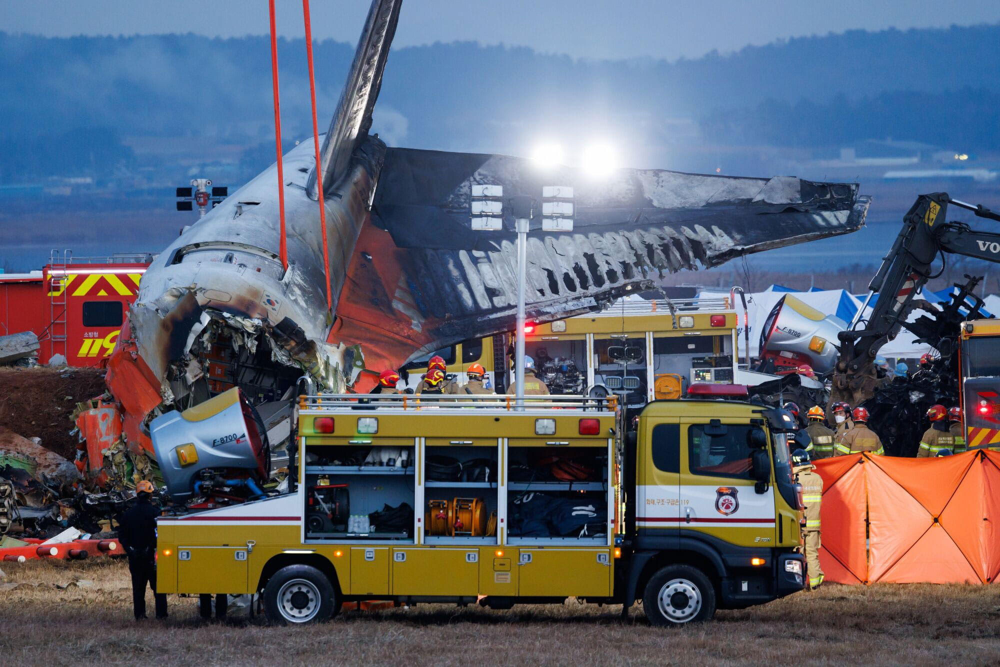The wreckage of Jeju Air Co. Flight 2216 at Muan International Airport in Muan County, South Korea